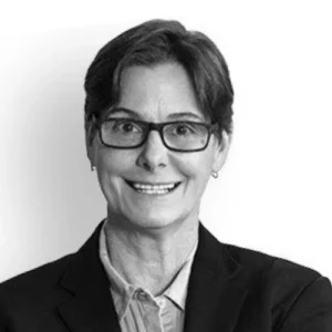 Betsy Mason in dark shirt and black blazer