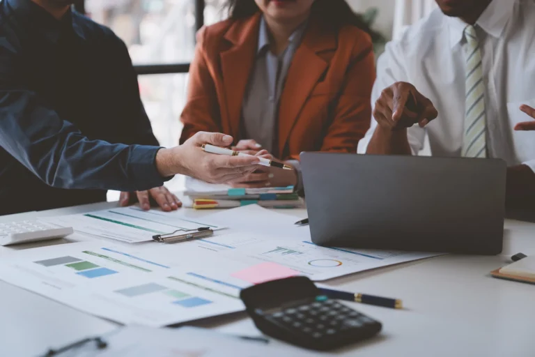 Business group present and explain project reports and planning strategies.