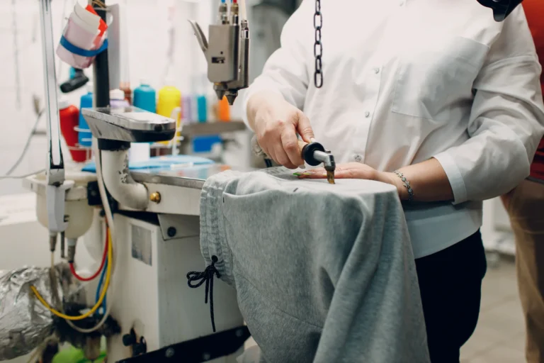 Dry cleaning clothes and removing dirty spot.