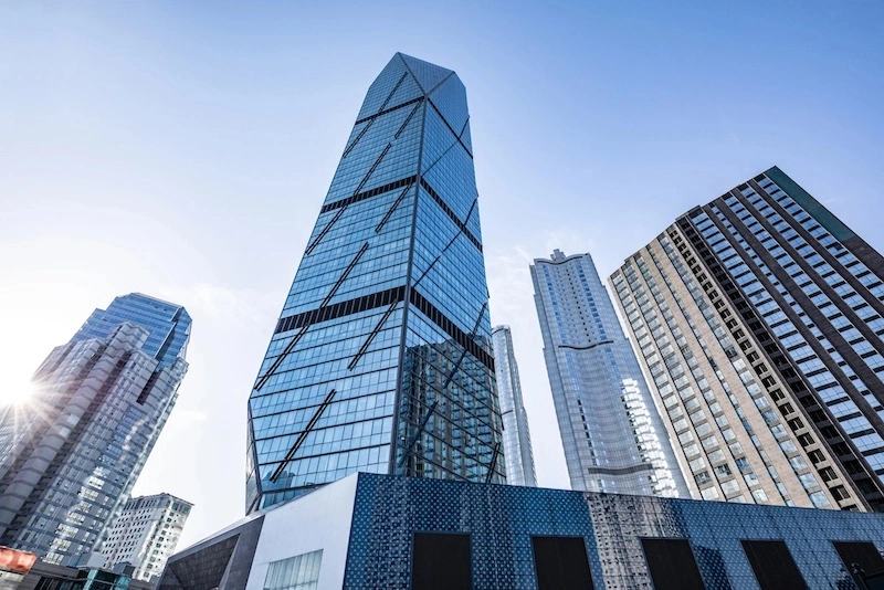 Low angle shot of modern glass building.
